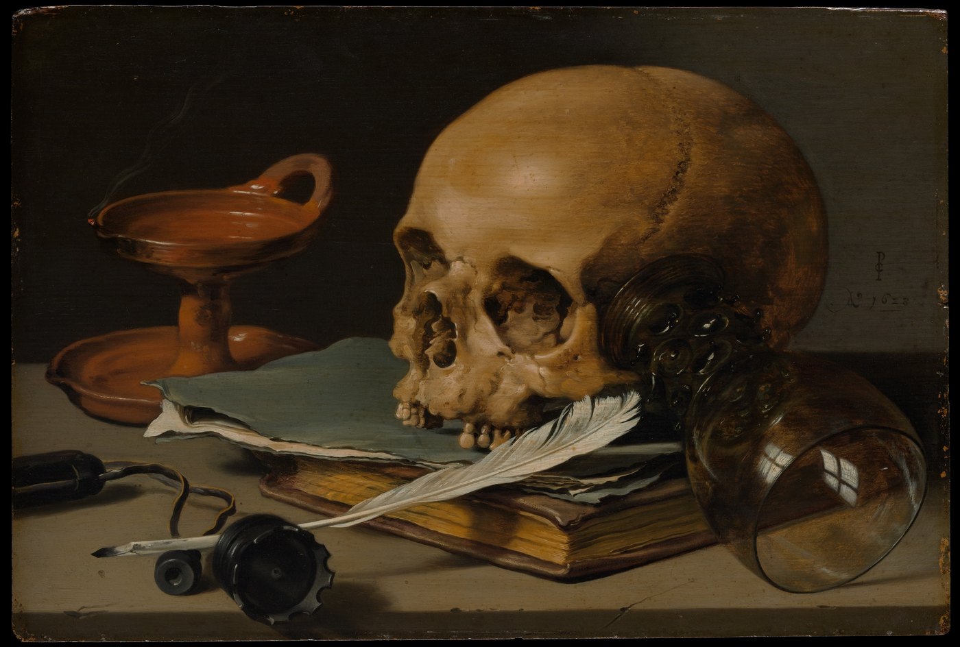 Still life with a skull and a writing quill